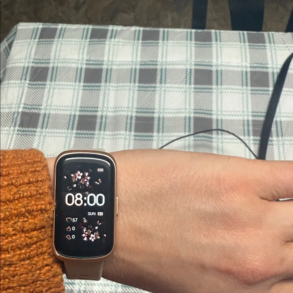 Elegant Gold Smartwatch with Floral Display